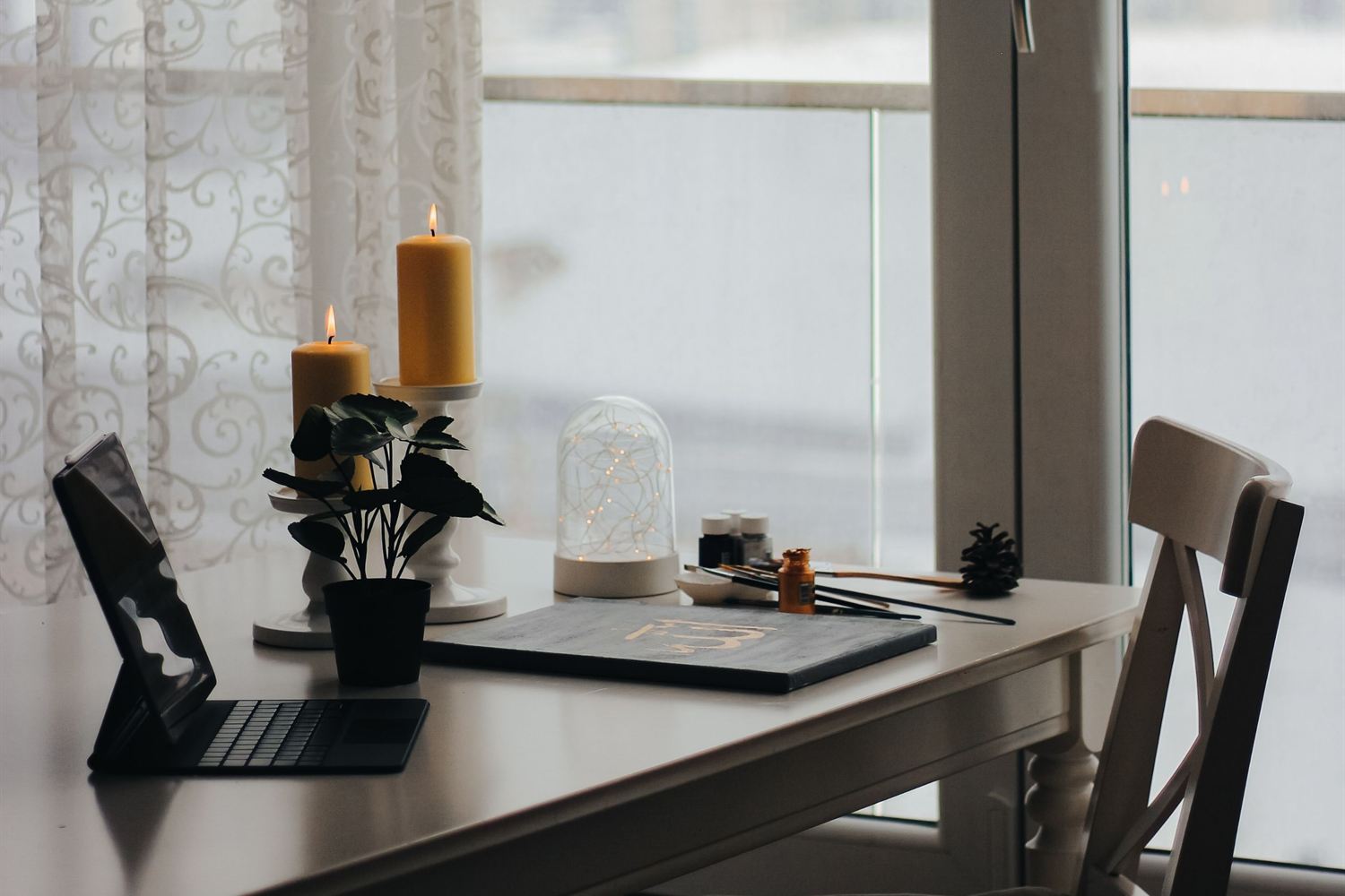 A calm workspace by a window overlooking the city