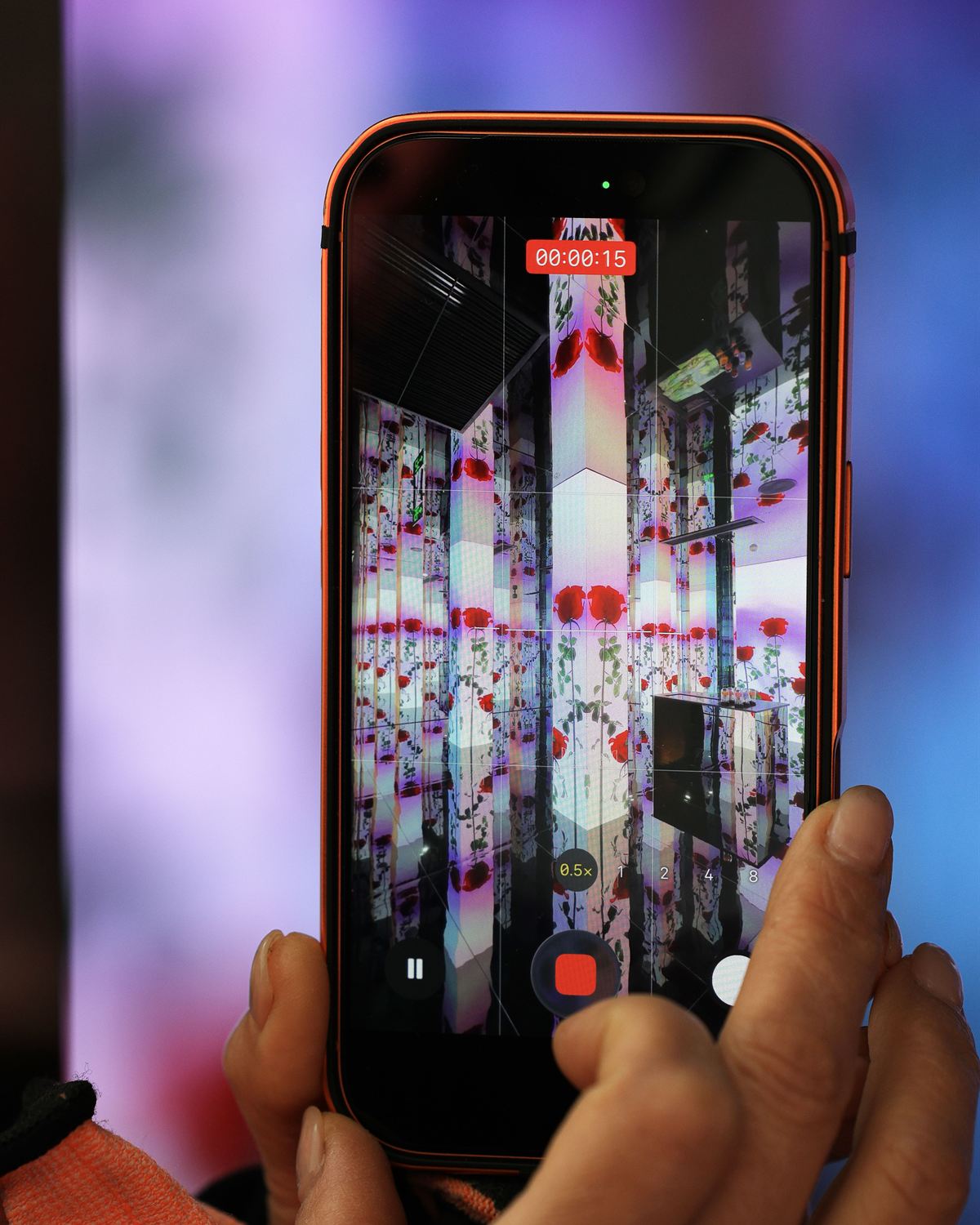Person filming a vertical video on a smartphone